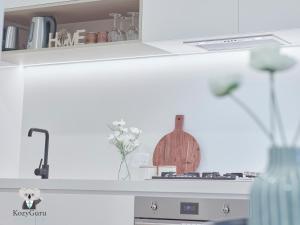 KozyGuru | Box Hill | Chic & Close to It All