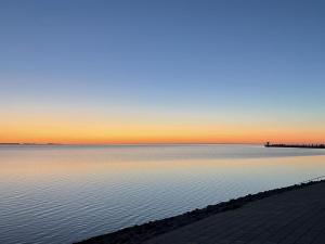 Brandgans 40 - Komfort-Ferienhaus mit eingezäuntem Garten, Sauna & Kamin