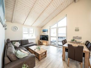 Brandgans 40 - Komfort-Ferienhaus mit eingezäuntem Garten, Sauna & Kamin