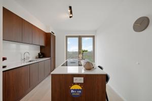 Exclusive two-bedroom apartment with panoramic sea and city views T153