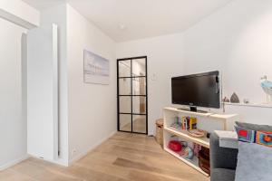 Sparrenduin - Compact en cosy app aan golf De Haan