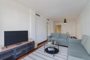 Apartamento Carlemany con tres habitaciones dobles