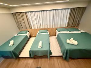 Hotel 4 estrelas Moema 2 Camas Queen 4 Solteiro