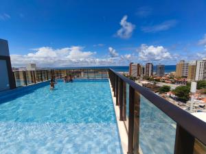 Studio com varanda vista mar em Armação