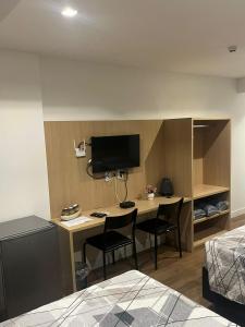 Flat Executivo Garvey Hotel