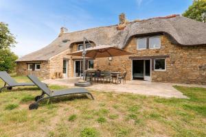 Chaumiere bretonne avec jardin - Golfe du Morbihan