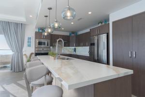 Impressive & beautiful 3 bedroom end unit Ocean Front Encantame C-1901