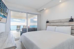 Family Paradise! 3 bedroom Corner Condominium Beach Front Encantame C-701