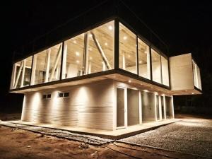 Concrete house overlooking the ocean and beach access