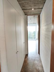 Concrete house overlooking the ocean and beach access