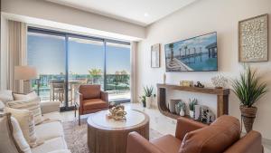 R202: Stylish 1-Bedroom Condo with Private Balcony, King Bedroom, and Relaxing Ocean Views