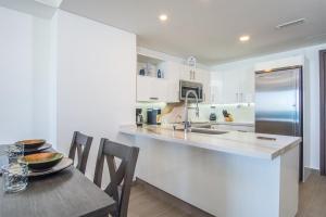 Panoramic beach front condo Verano 1703