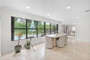 Bright Fort Lauderdale Villa with Private Heated Pool, Modern Décor and Palm-Lined Outdoor Oasis