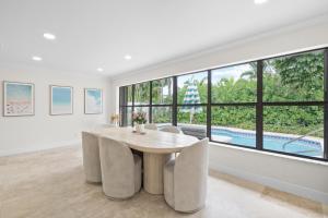 Bright Fort Lauderdale Villa with Private Heated Pool, Modern Décor and Palm-Lined Outdoor Oasis
