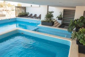 Alojamiento A Unas Calles del Malecon