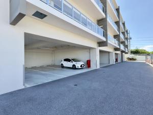Coral Palace Onna by Sunset Avenue