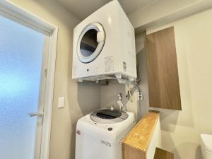 Coral Palace Onna by Sunset Avenue