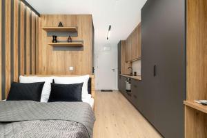 Klimatyzowane Studio dla Dwóch Osób Praca Zdalna by Noclegi Renters