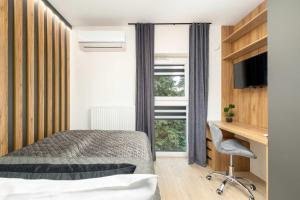 Klimatyzowane Studio dla Dwóch Osób Praca Zdalna by Noclegi Renters