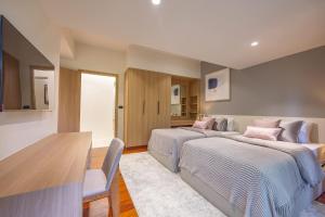 Elegant 4-Bedroom Pool Villa with Rooftop Sala