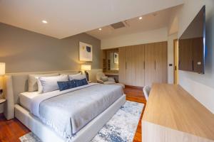 Elegant 4-Bedroom Pool Villa with Rooftop Sala