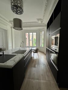 Maison cosy avec jardin privé hypercentre Charleville-Mézières à deux pas de la Place Ducale