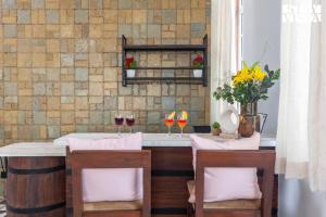 StayVistas Rustique Radiance - Hillside Retreat with Outdoor Pool & South Indian Architecture