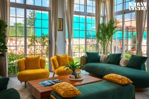 StayVistas Rustique Radiance - Hillside Retreat with Outdoor Pool & South Indian Architecture