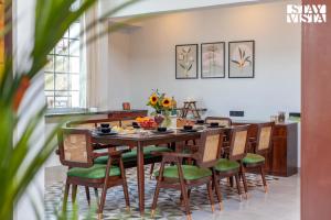 StayVistas Rustique Radiance - Hillside Retreat with Outdoor Pool & South Indian Architecture