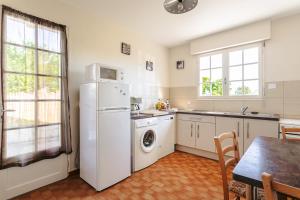 Maison au Coeur de Grand Village