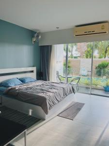 Chic 10 minutes to reach the karon beach, with free swimming pool and gym, WIFI