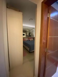 Apartamento térreo com piscina, vaga para 2 carros