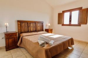 ISA - Apartments with common swimming-pool and outdoor private area in Badesi