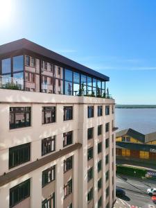 Xtay Cais Rooftop - Studios aconchegantes com Sky view para o Guaiba