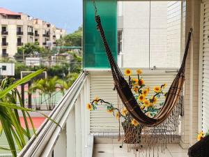 Home 43| Apto em cond Pé na Areia em Bertioga