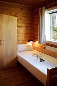 Blockhaus Ferien - Ferienhaus Arnarson