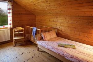 Blockhaus Ferien - Ferienwohnung Rollo