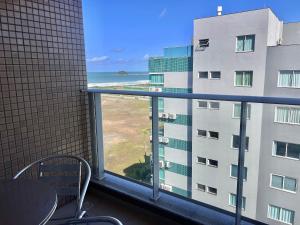 Apto piscina vista mar na praia de Palmas.- CC01J