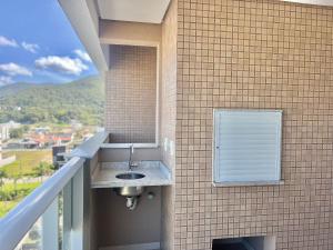 Apto piscina vista mar na praia de Palmas.- CC01J