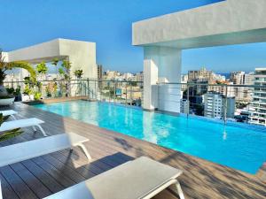 Upscale City Center Condo Pool