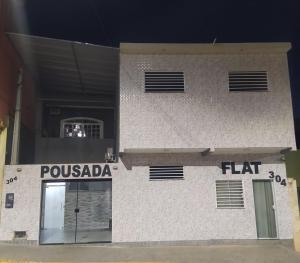Pousada Quarto com ventilador,ar frigobar e garagem