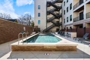 Three King Suites with Pool Gym Balcony Garage Right on Music Row Downtown Views from Rooftop Walk to RCA Studio B & Local Dining Elevator Access 24 Hr Hospitality