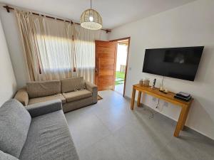 Casa Praiana com Piscina Privativa.