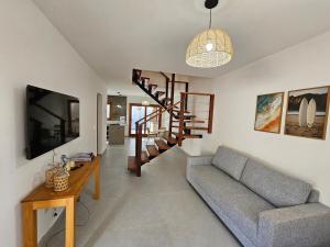 Casa Praiana com Piscina Privativa.