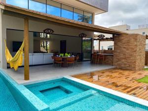 Casa 04 Suítes no Residencial Muro Alto By HomeTemp