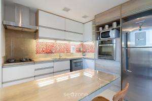 Apto c varanda gourmet a 300m da Praia CMS0202