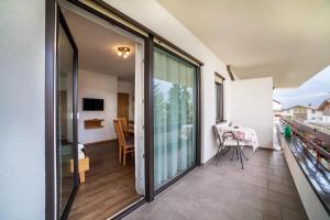 Schnitzer Ferienwohnung Löwenzahn