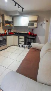 Apartamento pé na areia no centro de Tramandaí!