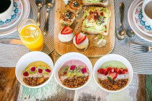 Pousada Rosa 08 - Café da manhã Gourmet, Suítes com Banheira a 150m do Centrinho da Praia do Rosa