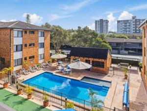 Budget Friendly & Unrenovated Beachside Family with Balcony & Resort Perks Sandcastles 234